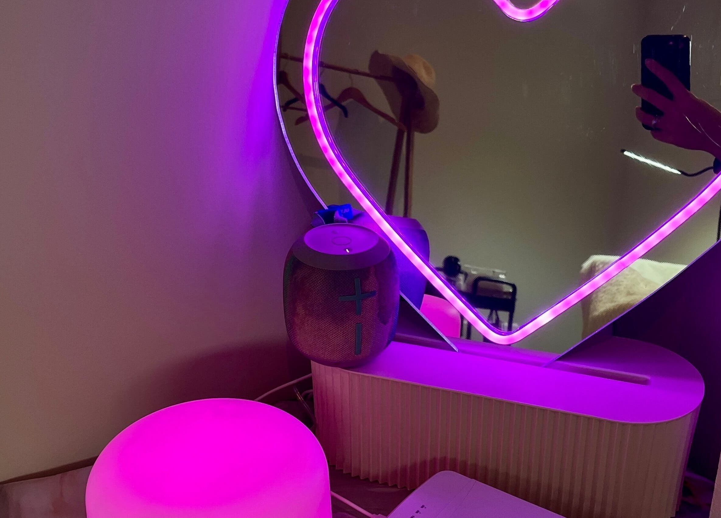 Heart-shaped purple light decor at Bayside Lashes Studio, Melbourne, Victoria, AU, enhancing the relaxing ambiance.
