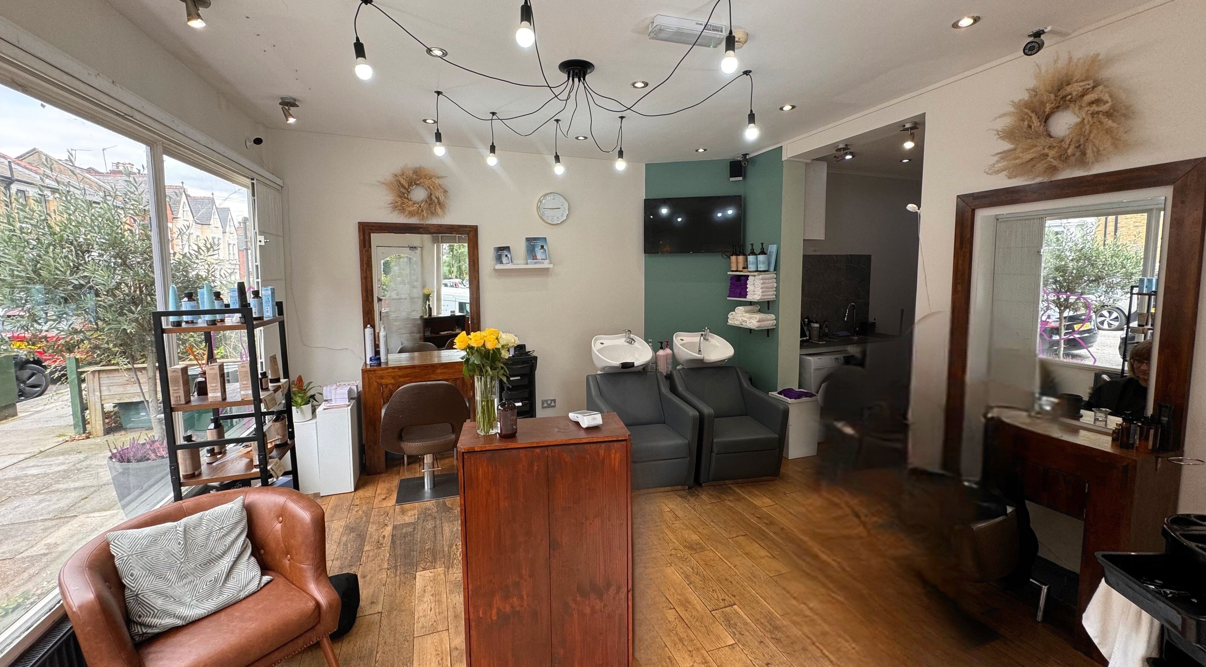 Chic interior of Classic Beauty London, London, England, GB featuring cozy seating and stylish decor.