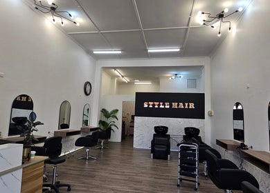 Elegant interior of Style Hairstudio in Melbourne, Victoria, AU with modern decor and styling stations.