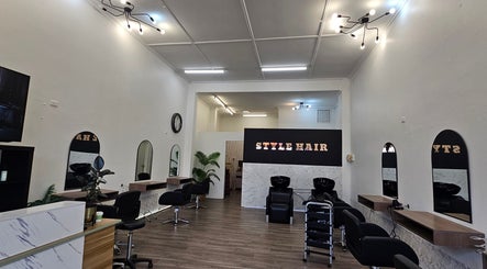 Elegant interior of Style Hairstudio in Melbourne, Victoria, AU with modern decor and styling stations.