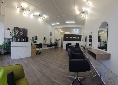 Style Hairstudio interior with modern chairs and mirrors in Melbourne, Victoria, AU.