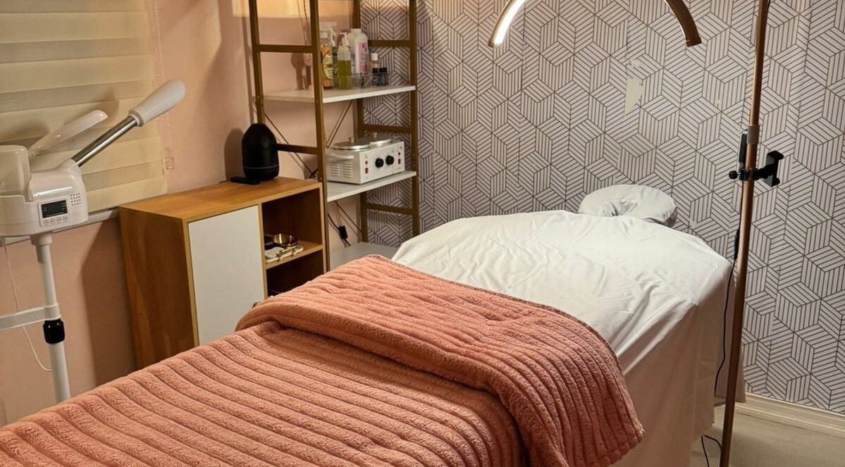 Treatment room at Treet Day Spa in Arima, Arima Borough Corporation, TT with a plush, pink blanket.