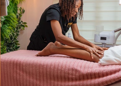 Relaxing leg massage at Treet Day Spa, Arima, Arima Borough Corporation, TT with calm ambiance.