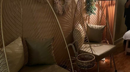 Relaxing seating area at Pressure Point Wellness Spa, Antipolo, Calabarzon, PH with cozy decor.