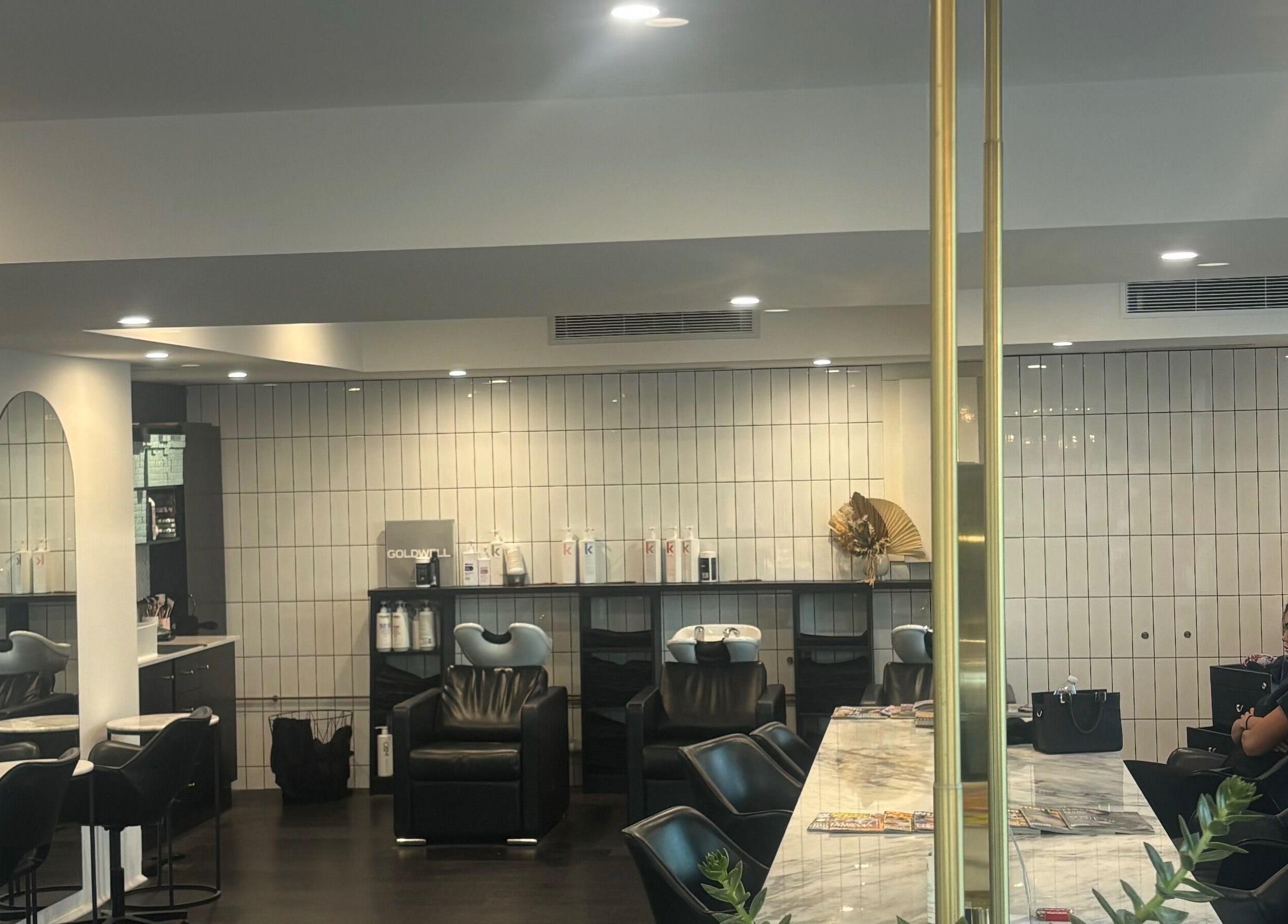 Modern salon interior at Hair by Carlene Jo in Scarborough, Western Australia, AU showcasing elegant styling stations.