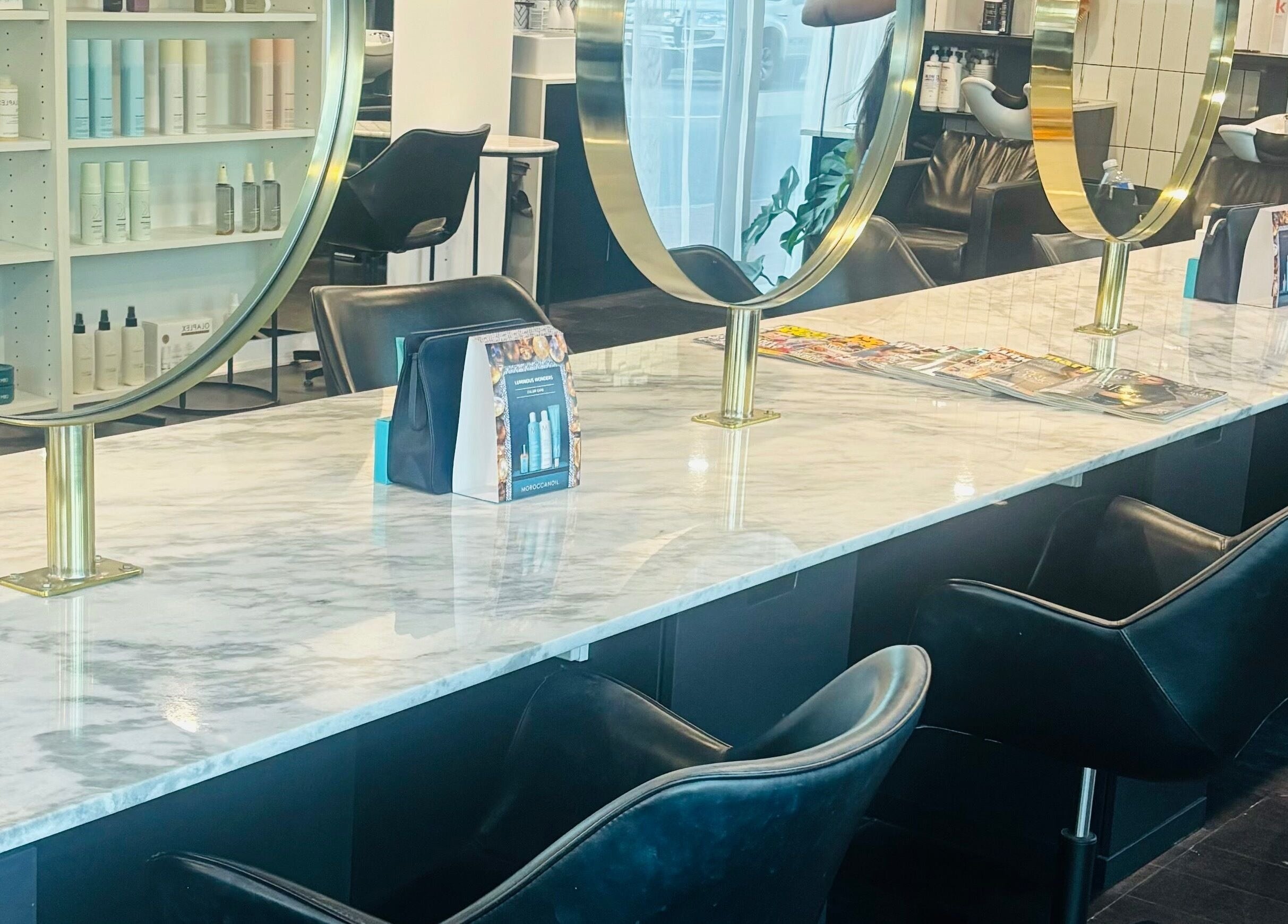 Elegant styling station at Hair by Carlene Jo, Scarborough, Western Australia, AU with marble countertop.