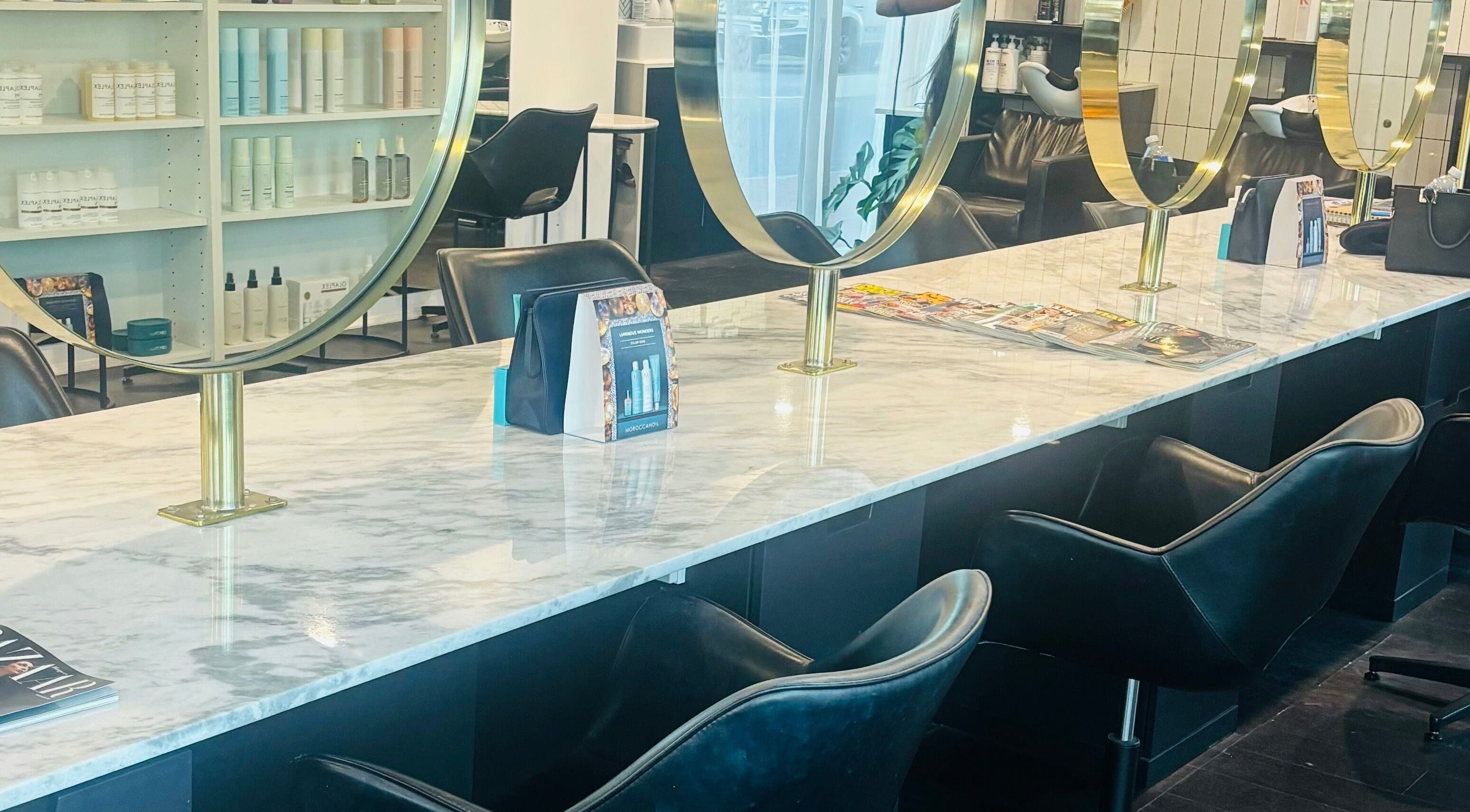 Elegant styling station at Hair by Carlene Jo, Scarborough, Western Australia, AU with marble countertop.