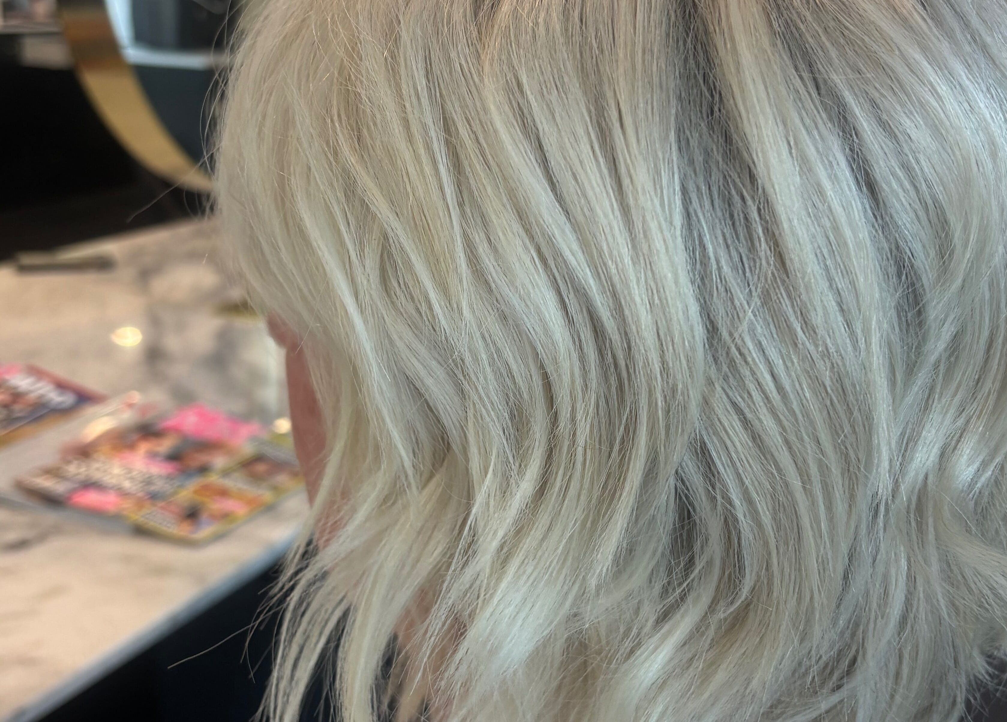 Silky blonde waves at Hair by Carlene Jo, Scarborough, Western Australia, AU. Perfectly crafted hair texture and shine.