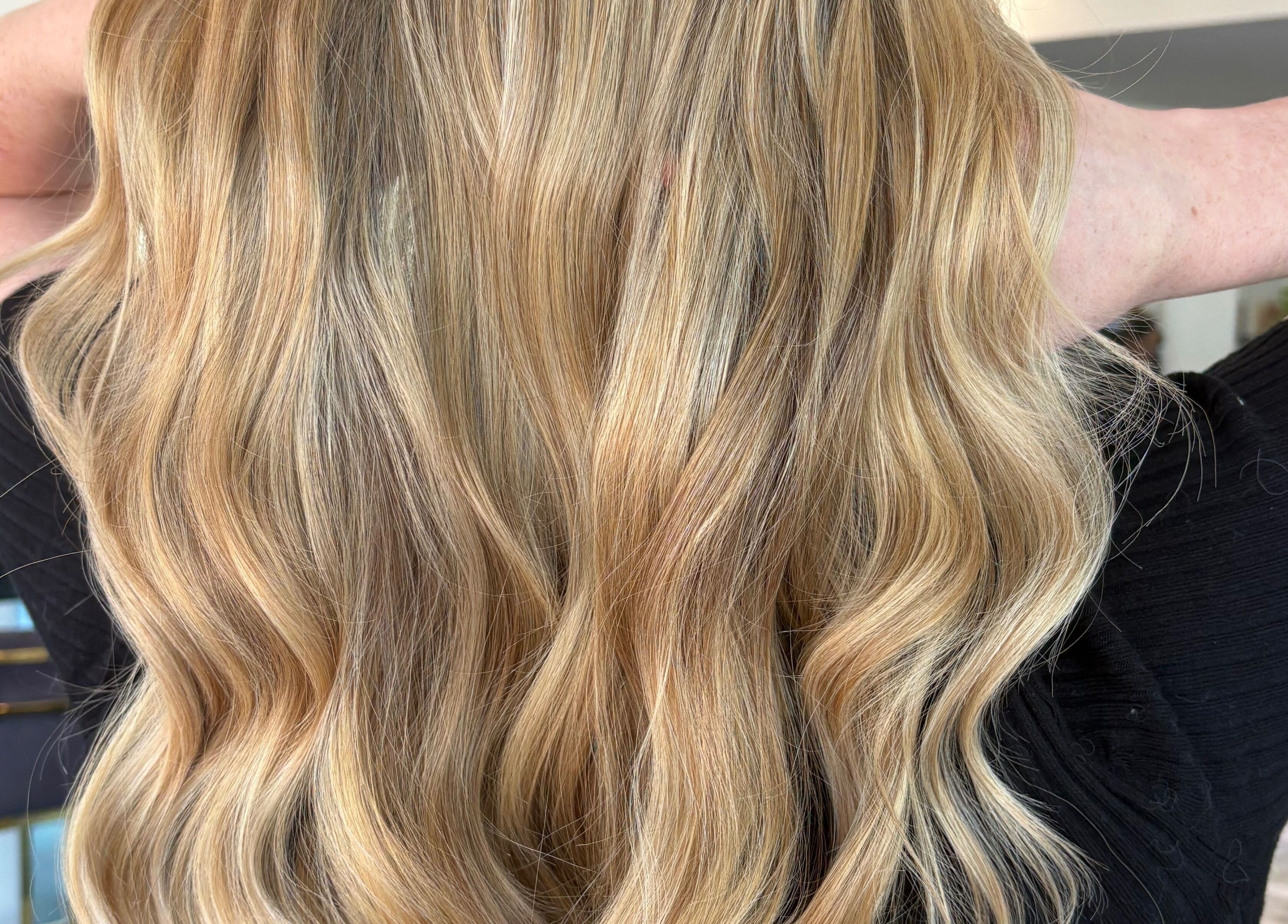 Blonde wavy hairstyle at Hair by Carlene Jo, Scarborough, Western Australia, AU.