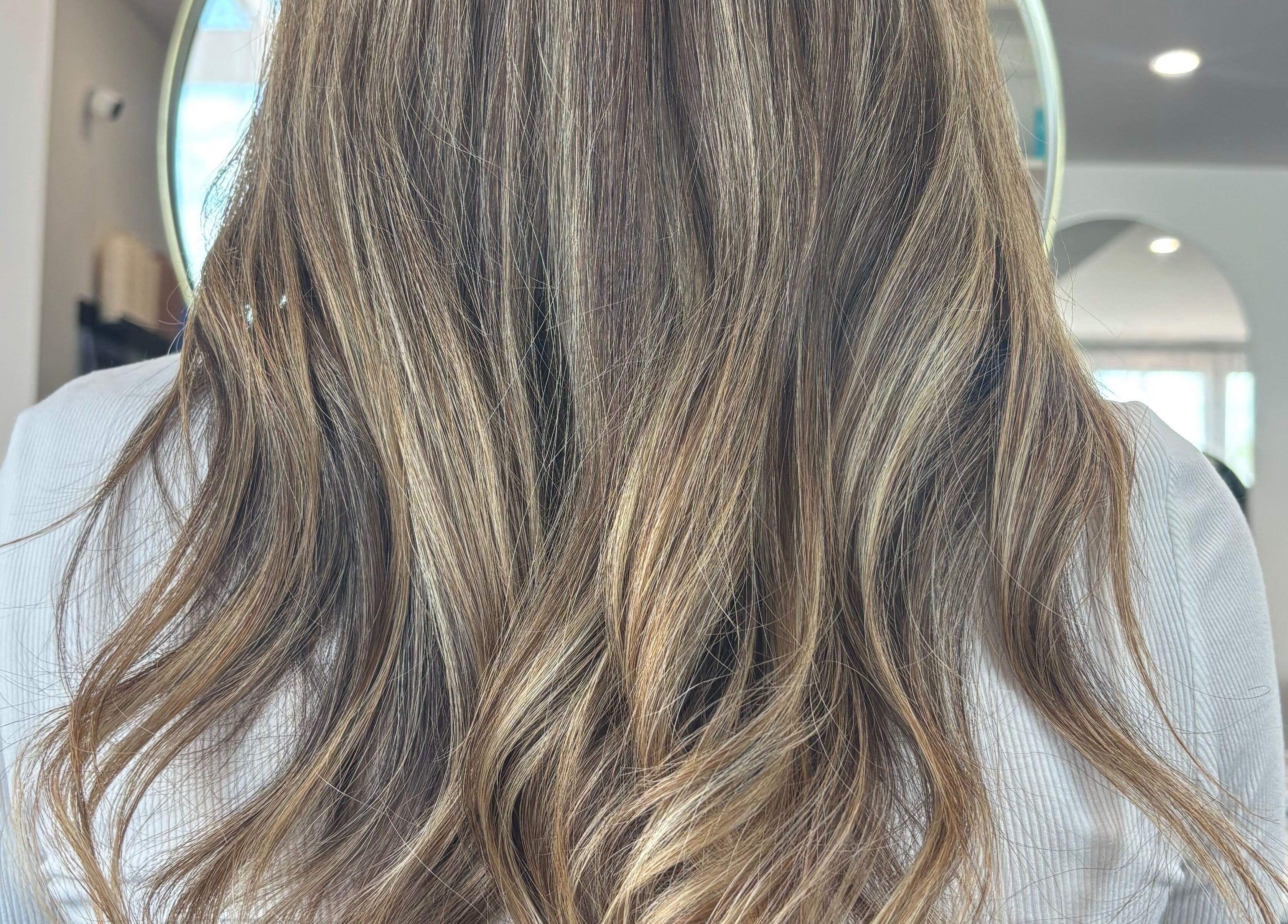 Close-up of wavy hair styling at Hair by Carlene Jo, Scarborough, Western Australia, AU.