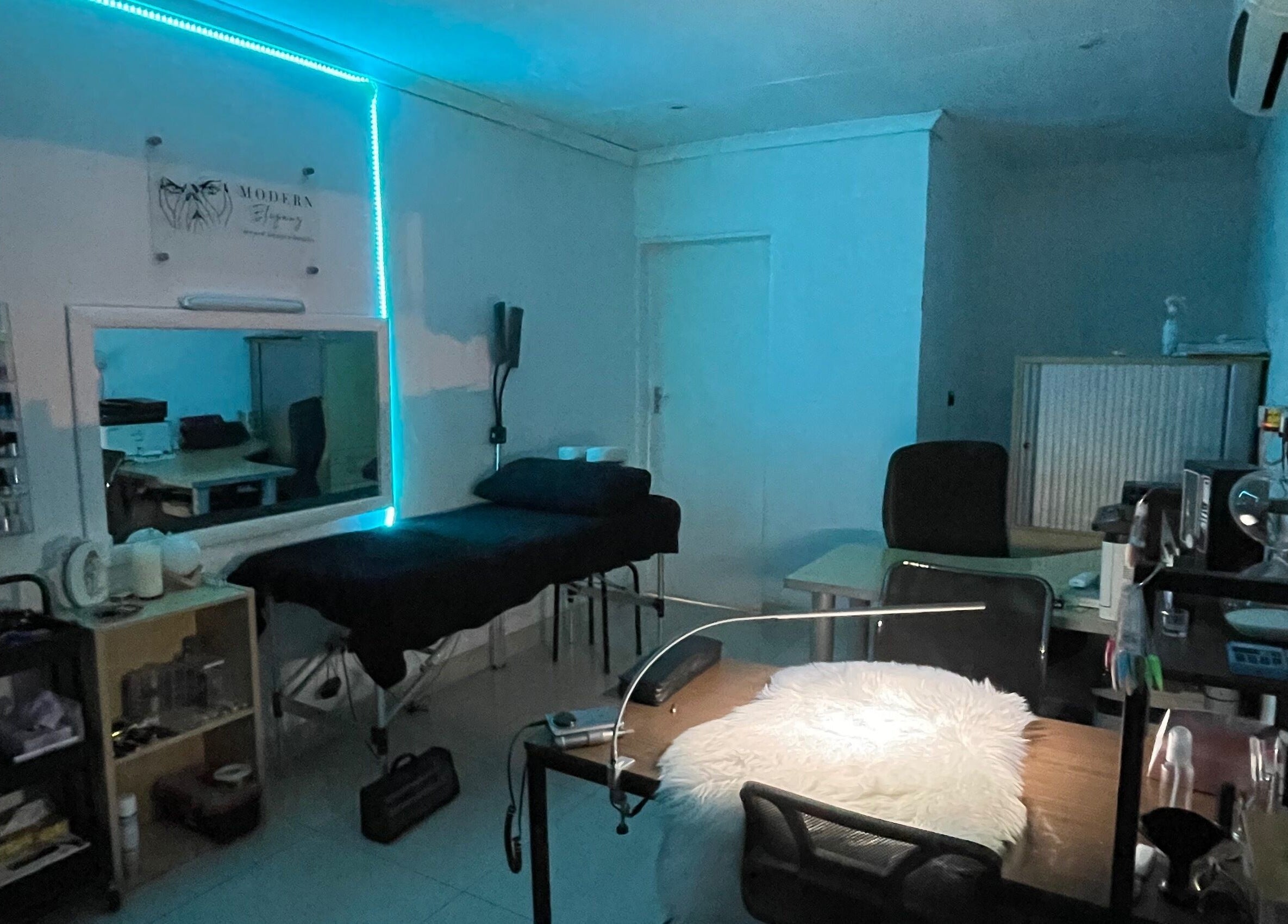 Modern Eleganz spa room with serene blue lighting in Soweto, Gauteng, ZA.