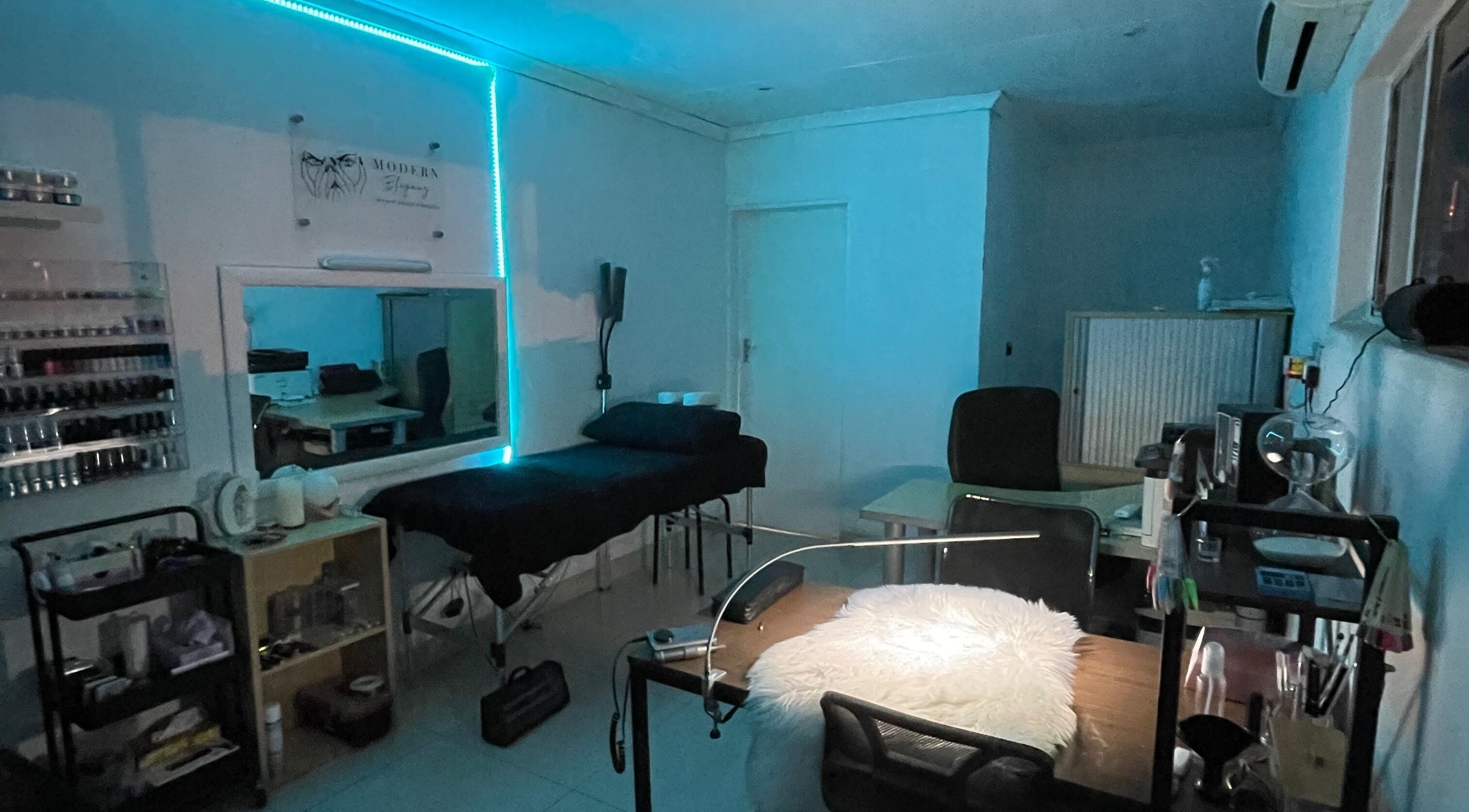 Modern Eleganz spa room with serene blue lighting in Soweto, Gauteng, ZA.