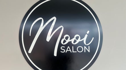 Mooi Salon logo displayed in Bloemfontein, Free State, ZA, capturing the salon's elegant branding.