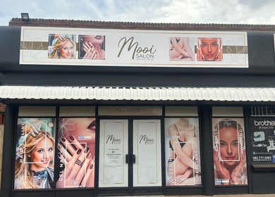 Mooi Salon facade in Bloemfontein, Free State, ZA, showcasing hairstyling and beauty treatments.