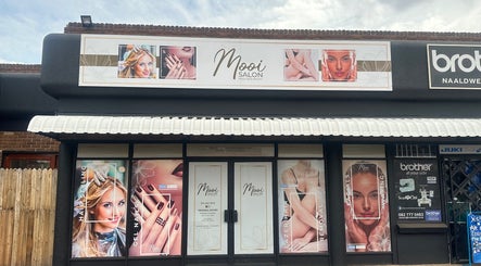 Mooi Salon facade in Bloemfontein, Free State, ZA, showcasing hairstyling and beauty treatments.