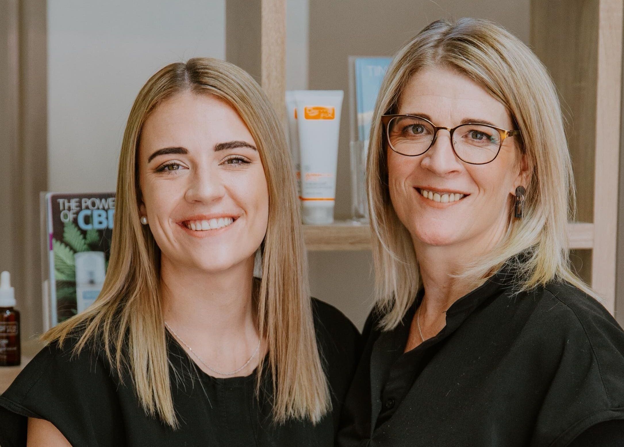 Smiling staff at Mooi Salon, Bloemfontein, Free State, ZA, providing expert beauty and wellness services.