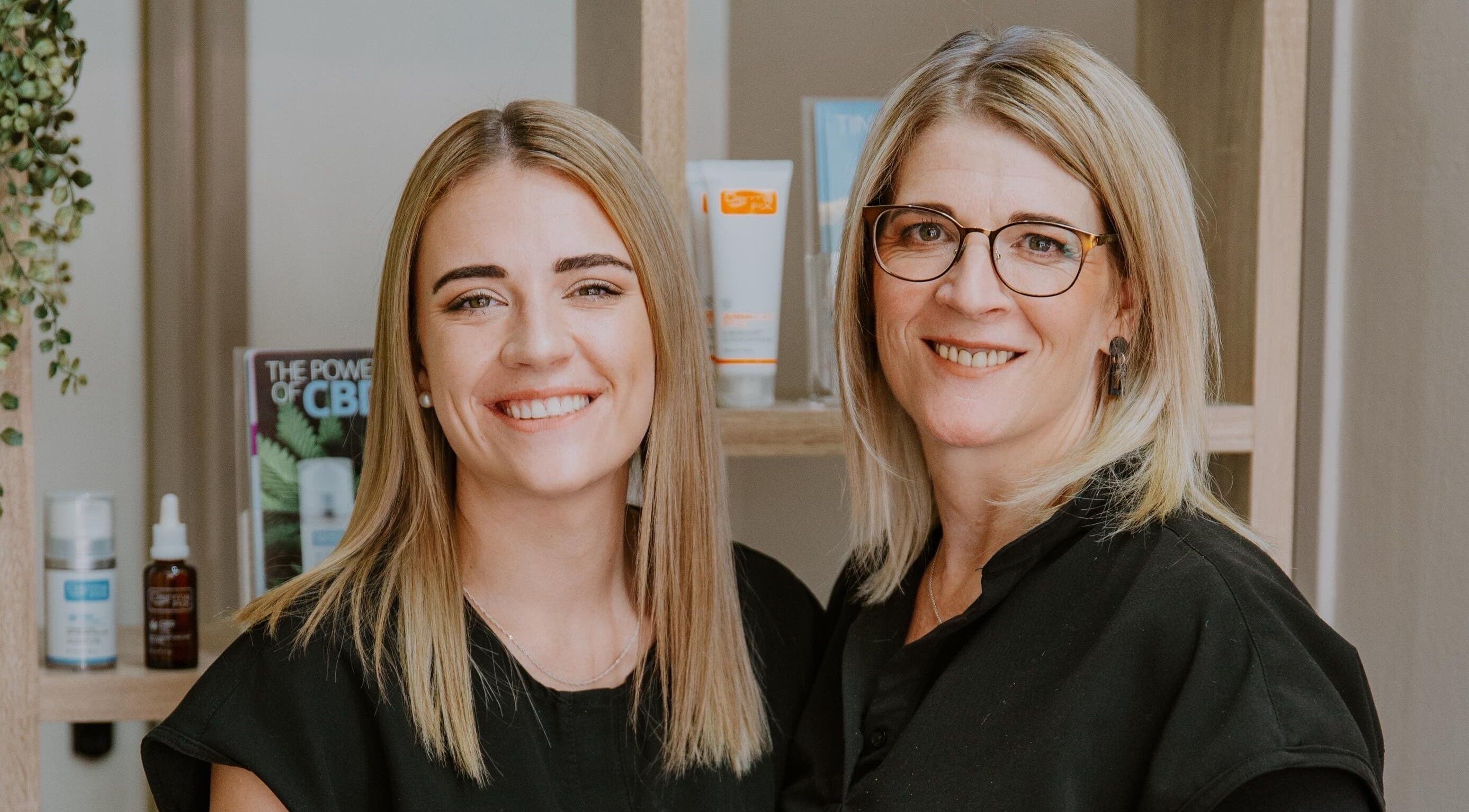 Smiling staff at Mooi Salon, Bloemfontein, Free State, ZA, providing expert beauty and wellness services.