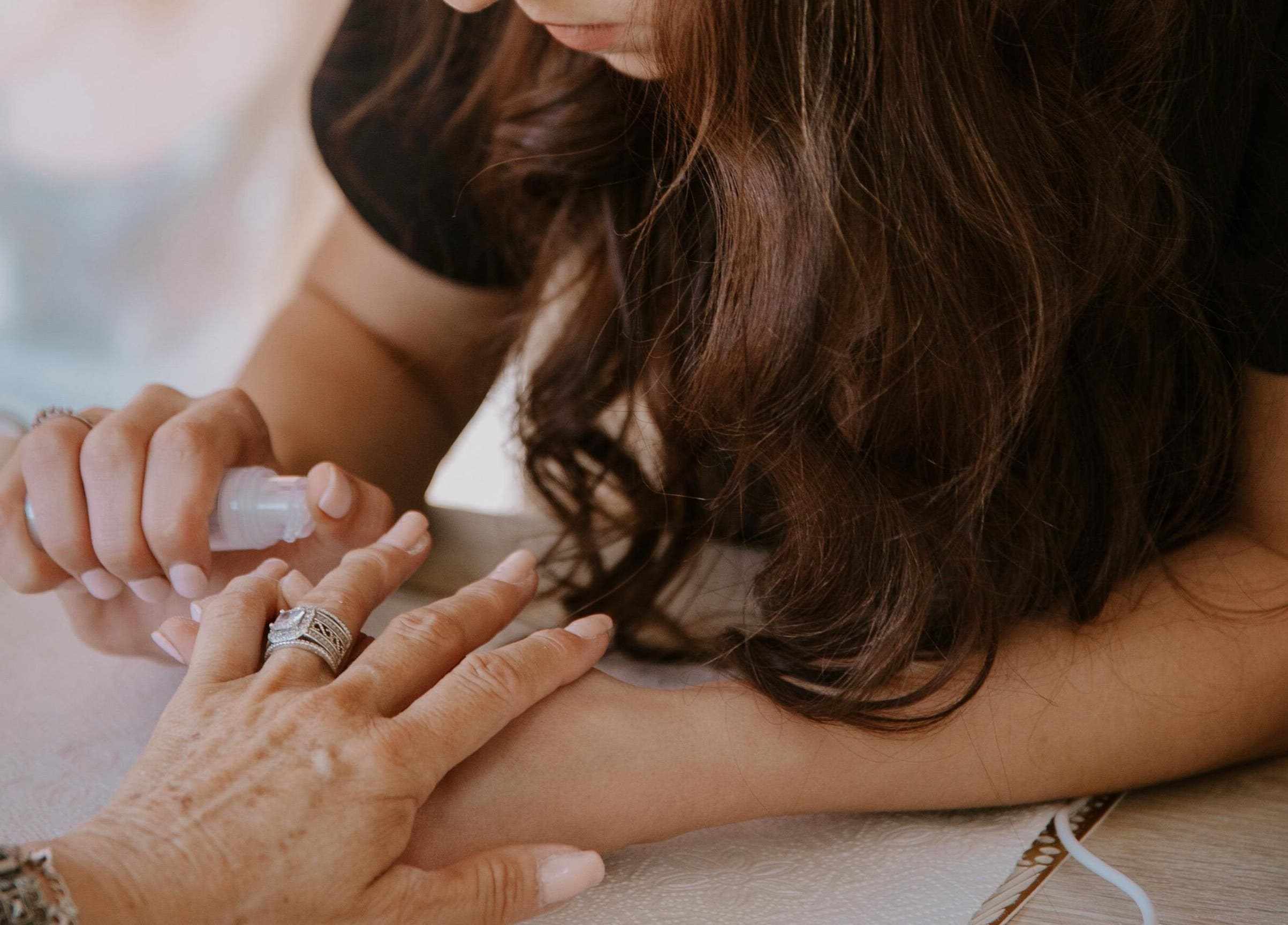 Professional manicure service at Mooi Salon, Bloemfontein, Free State, ZA showcasing delicate nail care.
