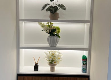 Chic floral arrangements on a modern shelf at Kang’s TCM Clinic, Runaway Bay, Queensland, AU.