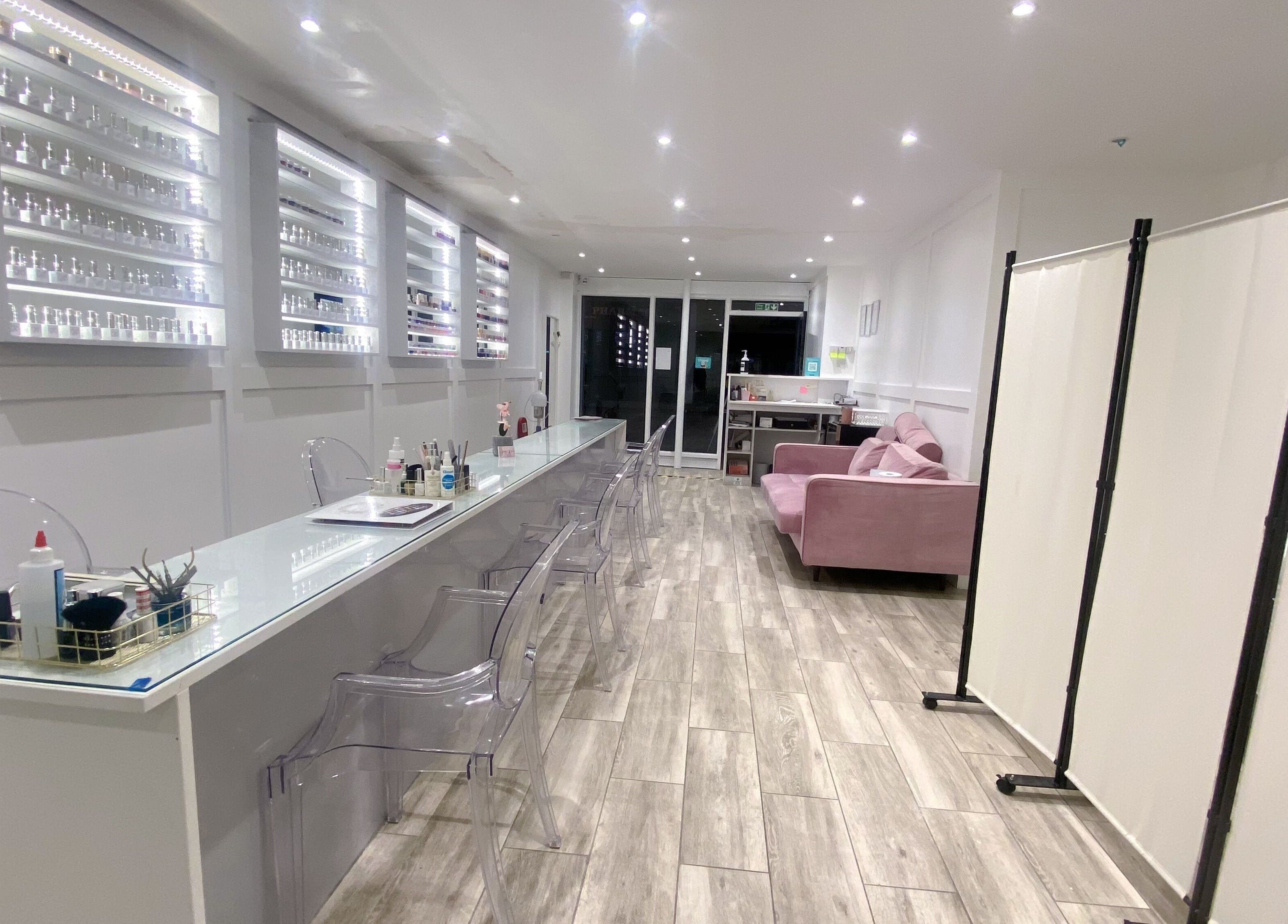 Modern nail salon interior at Jelly Nails, London, England, GB with sleek decor and comfortable seating.