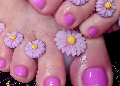 Floral embellished toenails at Magical Nails by Ewa, Spalding, England, GB. Perfect for unique, vibrant nail art.