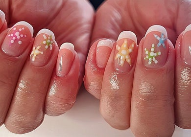Colorful floral nail art at Magical Nails by Ewa, Spalding, England, GB showcases artistic manicure designs.