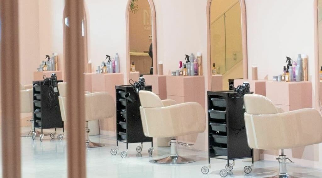 Elegant styling chairs at Mend Salon in Riyadh, Riyadh Province, SA offer a serene beauty experience.