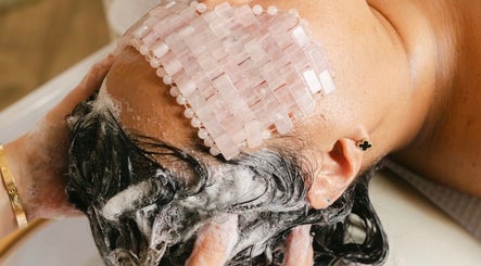 Relaxing scalp treatment at The Remedi Room, Wolverhampton, England, GB with soothing shampoo and crystal therapy.