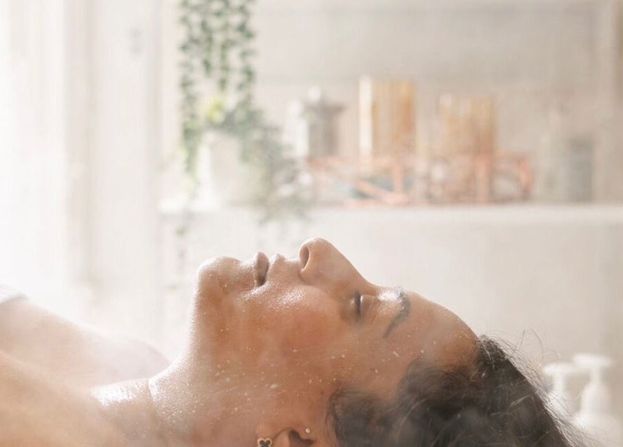 Relaxed individual enjoying a steam facial at The Remedi Room, Wolverhampton, England, GB.