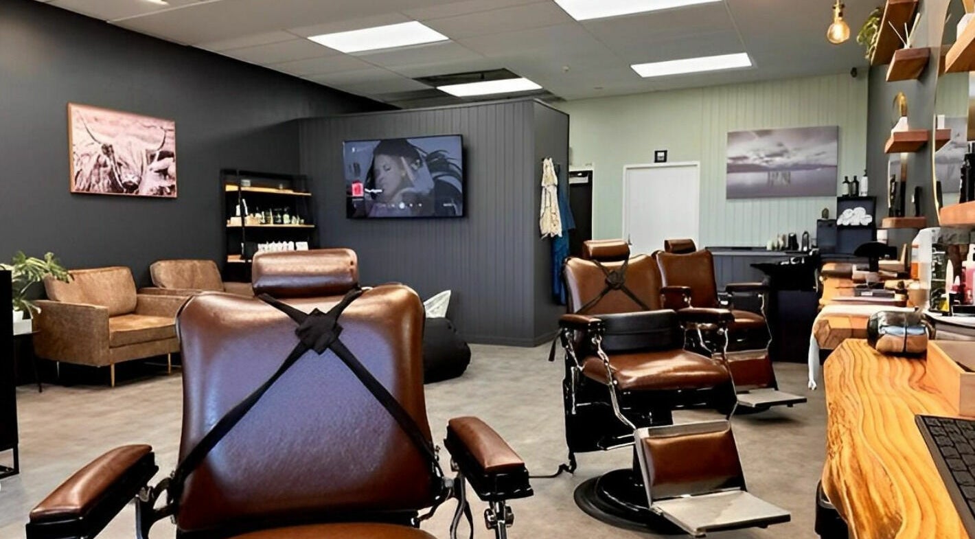 Interior of Barber Bros, Tauranga, Bay of Plenty, NZ featuring stylish barber chairs and modern decor.