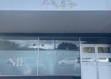 Front view of Bloom Beauty Room, Rotorua, Bay Of Plenty Region, NZ, showcasing modern storefront design.