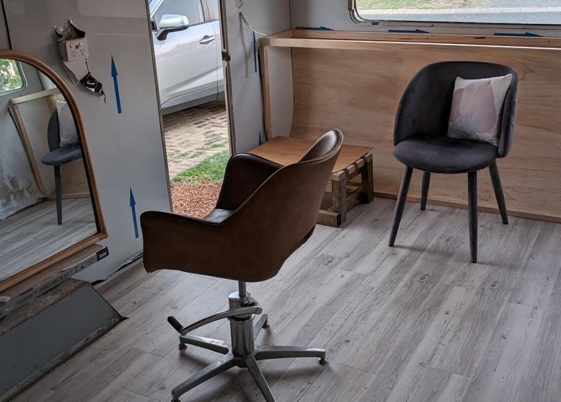 Modern salon interior at Hair NV by Jade in Heathridge, Western Australia, AU featuring sleek seating.