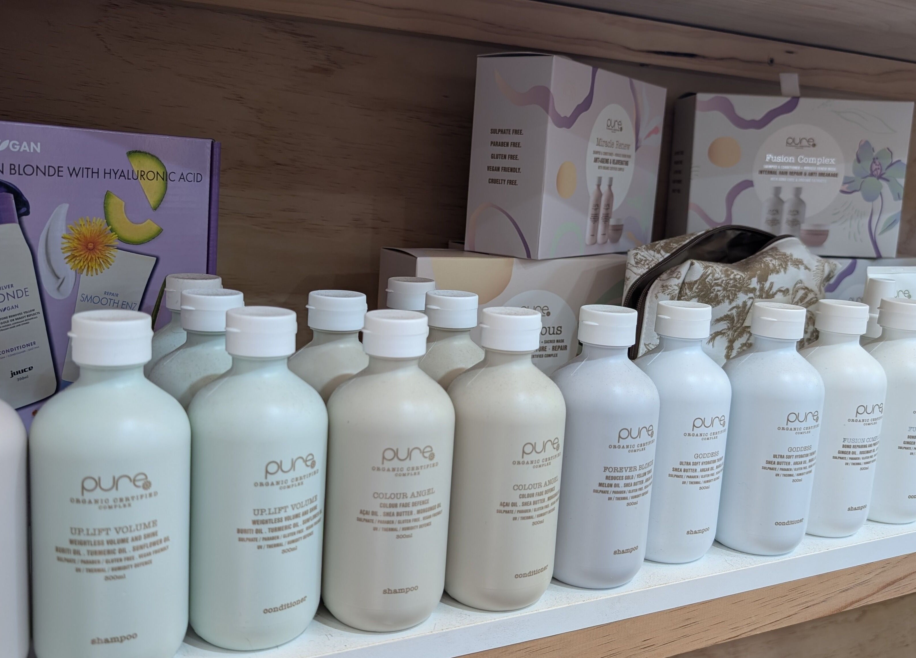 Shelves with premium hair products at Hair NV by Jade, Heathridge, Western Australia, AU.