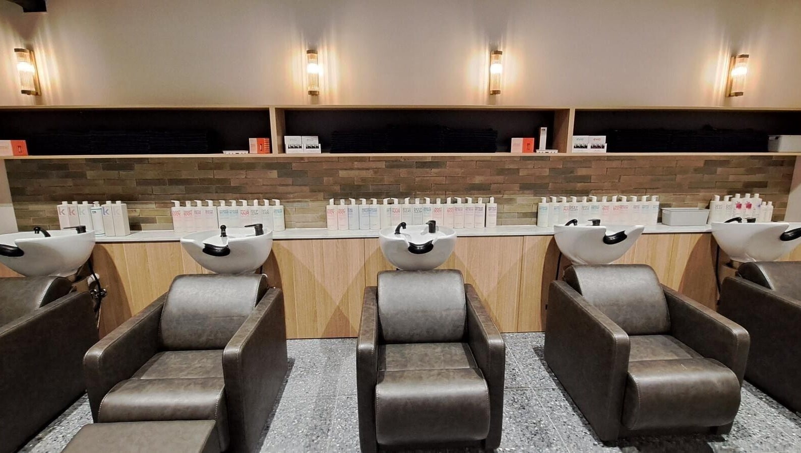 Stylish salon wash stations at The Blowout Bar - Brighton, Brighton, Victoria, AU enhance comfort and elegance.