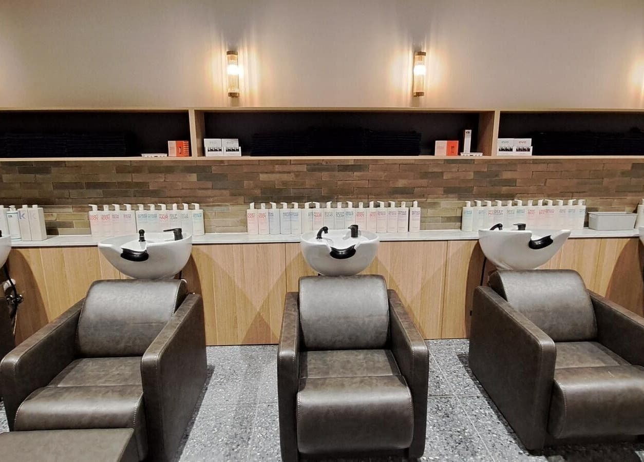 Stylish salon wash stations at The Blowout Bar - Brighton, Brighton, Victoria, AU enhance comfort and elegance.