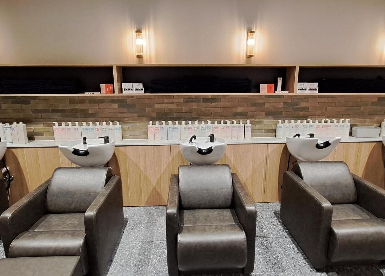 Stylish salon wash stations at The Blowout Bar - Brighton, Brighton, Victoria, AU enhance comfort and elegance.