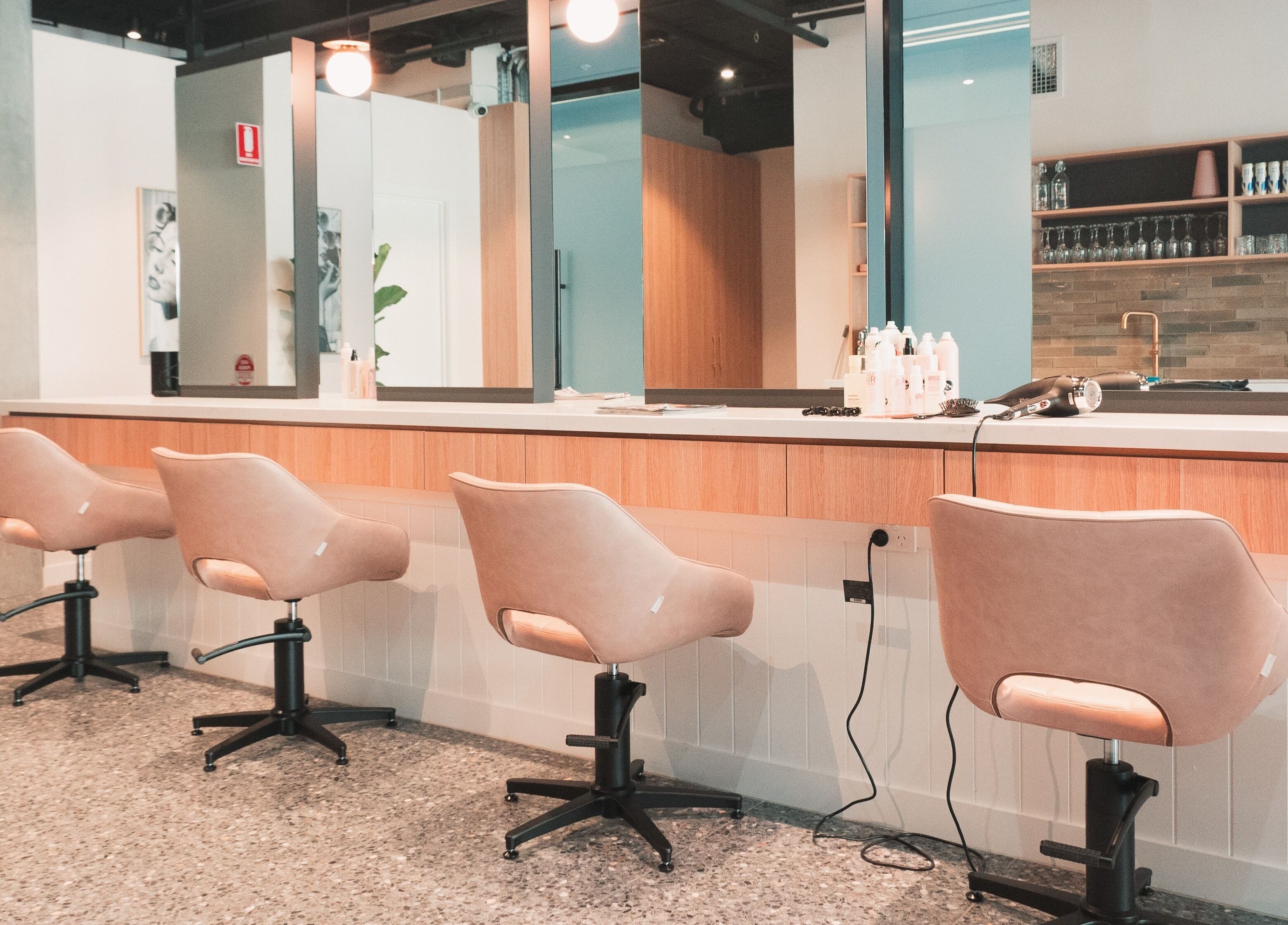 Chic styling chairs at The Blowout Bar - Brighton, located in Brighton, Victoria, AU.