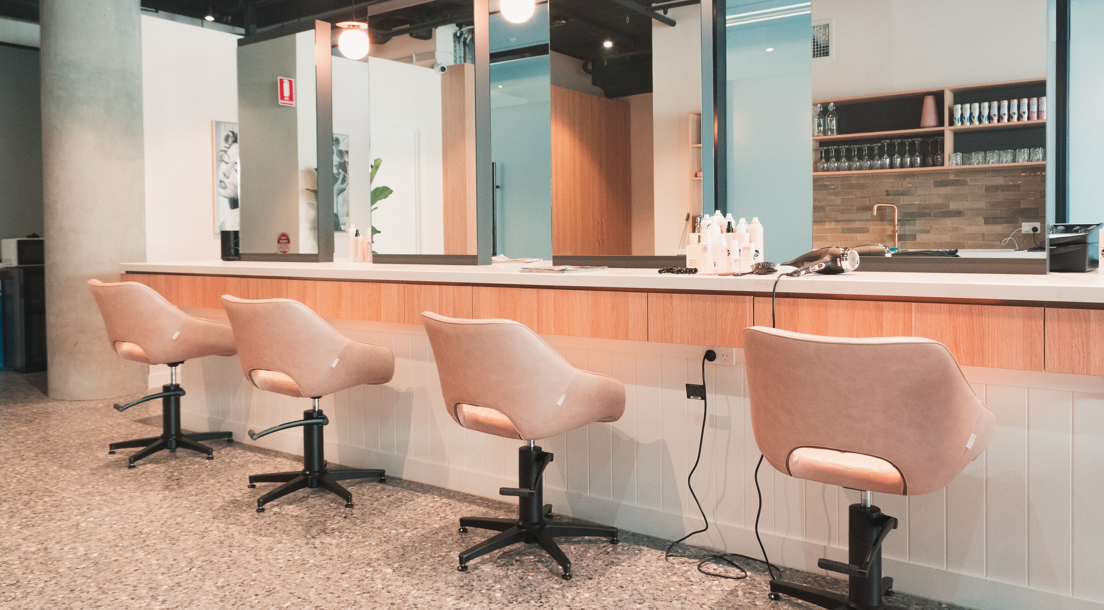 Chic styling chairs at The Blowout Bar - Brighton, located in Brighton, Victoria, AU.