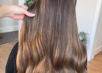 Smooth, shiny brown hair styled at DE Hair & Aesthetics, Kingsteignton, England, GB.
