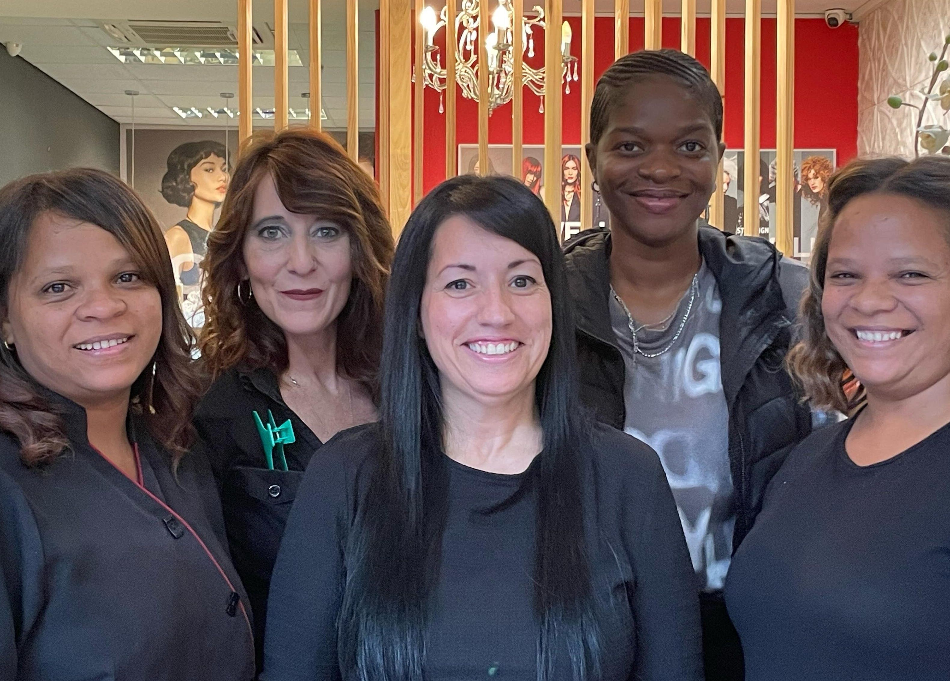Friendly team at Arriba Salon in Cape Town, Western Cape, ZA, ready to welcome customers.
