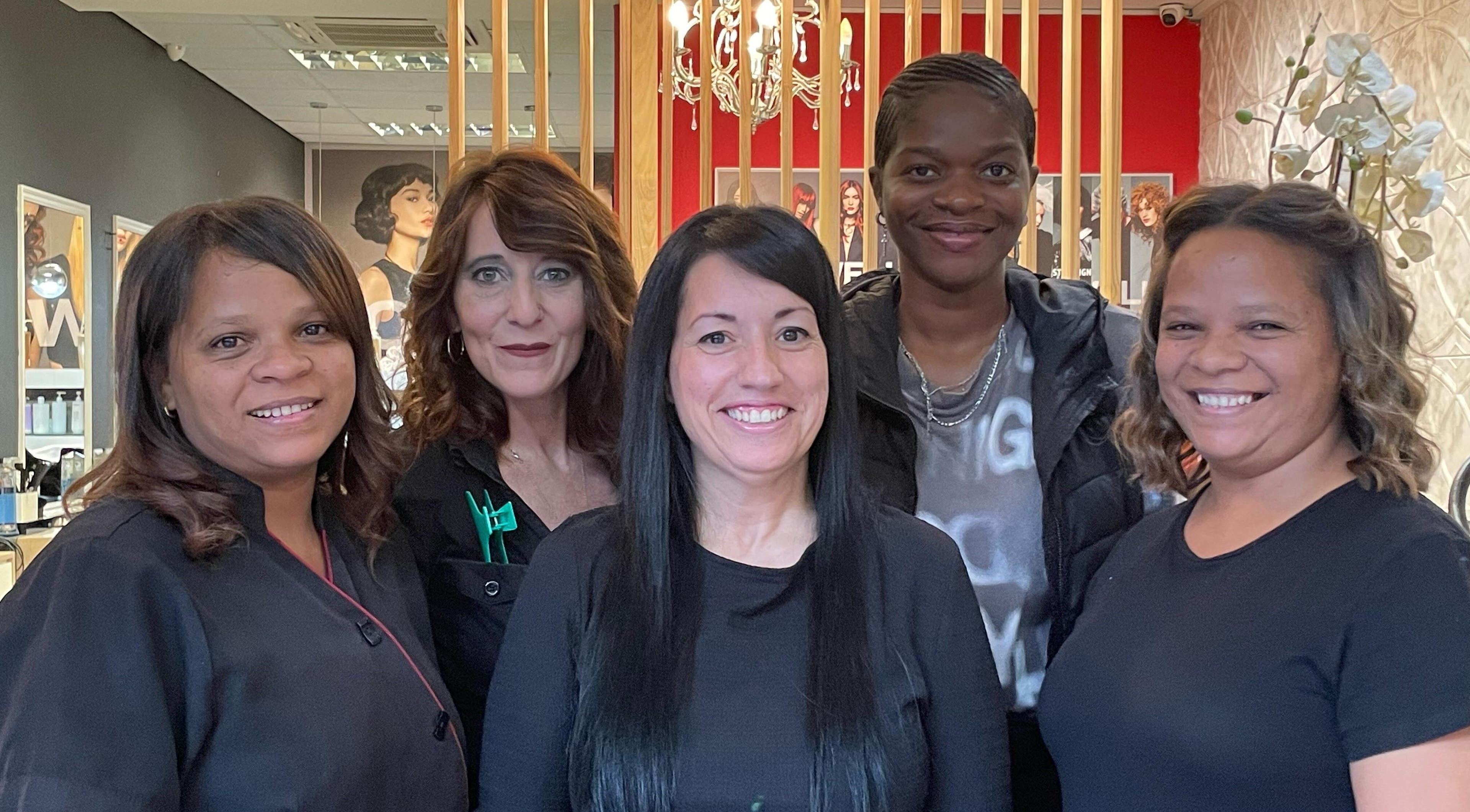 Friendly team at Arriba Salon in Cape Town, Western Cape, ZA, ready to welcome customers.