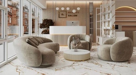Elegant reception area at By hope aphena @ wigston, Wigston, England, GB with plush chairs and marble flooring.