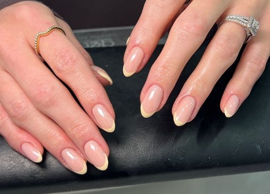 Elegant French manicure at By hope aphena @ wigston, Wigston, England, GB. Beautiful nail art display.