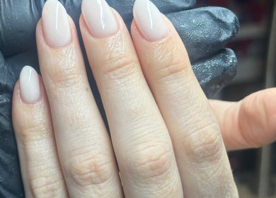 Glossy nude nails by Nails by Hope Aphena at Vixie Beauty Melton, Melton Mowbray, England, GB.