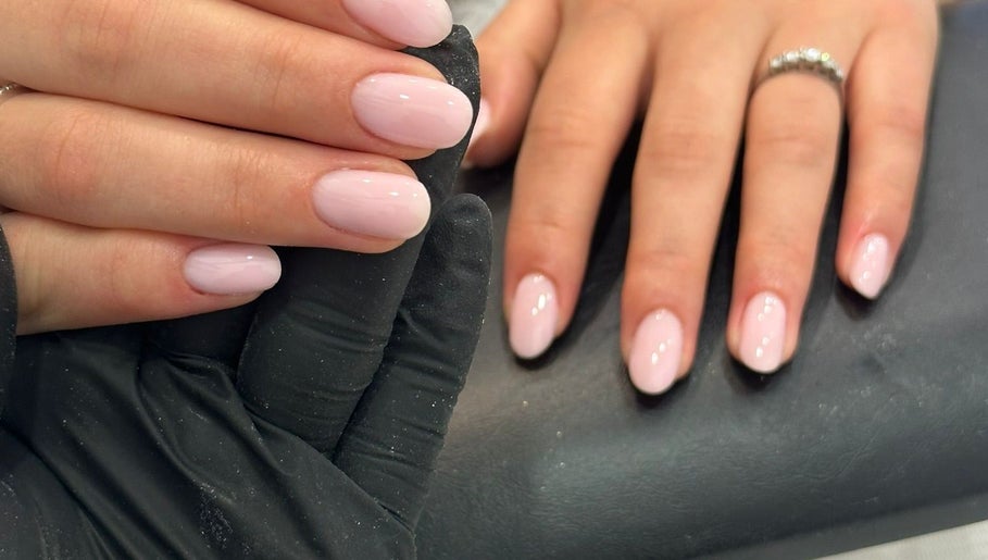Manicured nails at By hope Aphena @ Vxie beauty, Melton mowbary, England, GB. Soft pink polish displayed.