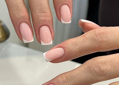 Elegant French manicure by Hope Aphena at Vxie Beauty, Melton Mowbary, England, GB.