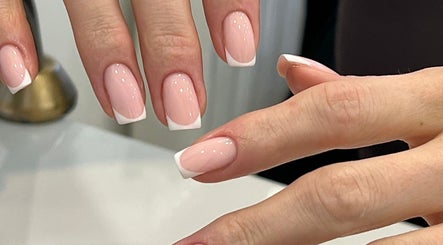 Elegant French manicure by Hope Aphena at Vxie Beauty, Melton Mowbary, England, GB.