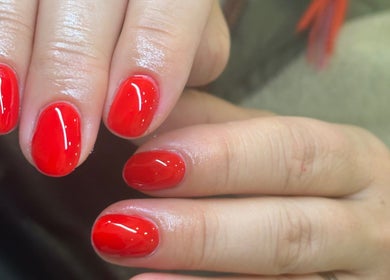 Bright red manicure at Studio By hope aphena Nails | Brows | Waxing in Leicester, England, GB.