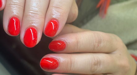 Bright red manicure at Studio By hope aphena Nails | Brows | Waxing in Leicester, England, GB.