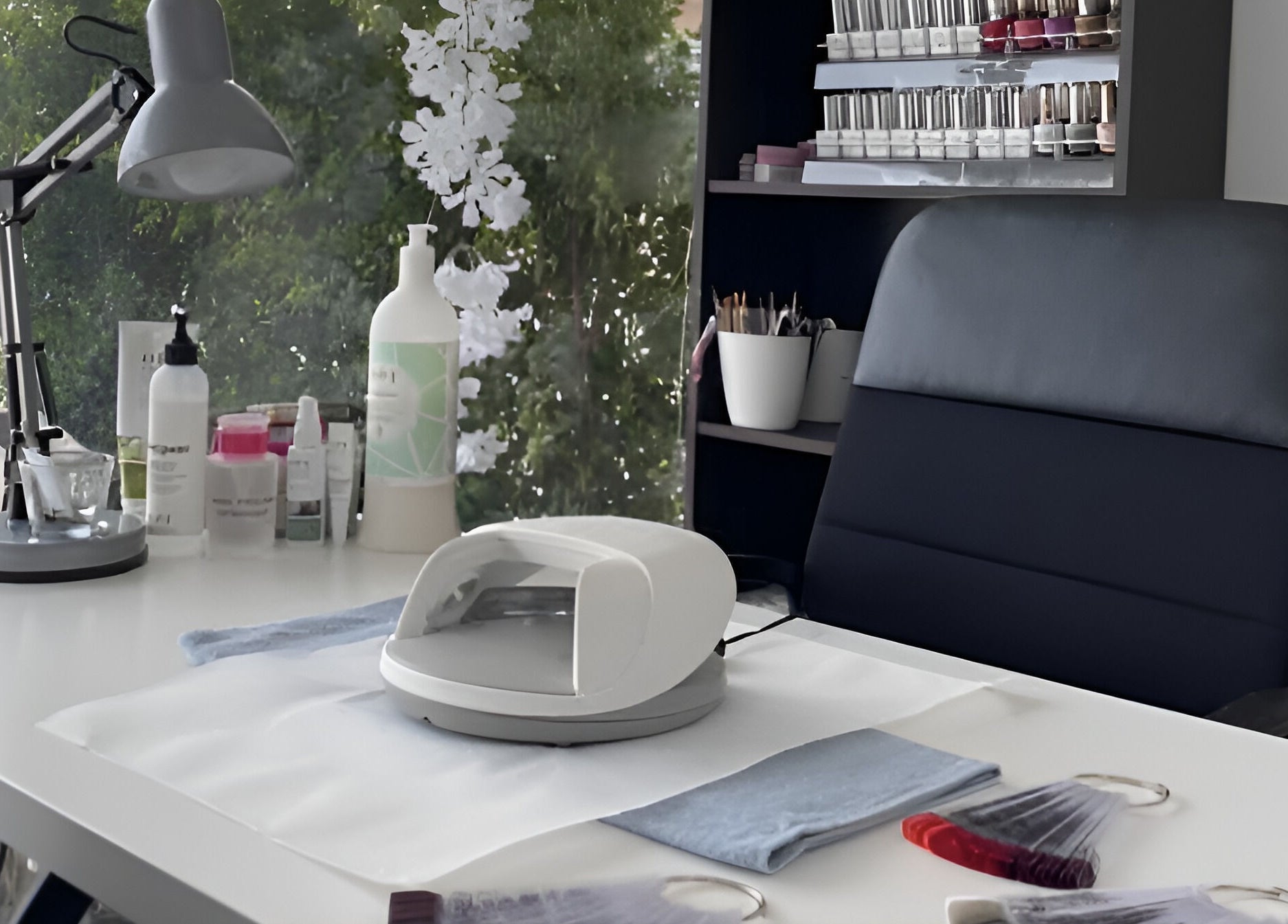 Elegant nail desk at The Cutting Room, Mandria, Paphos, CY, featuring manicure tools and polishes.
